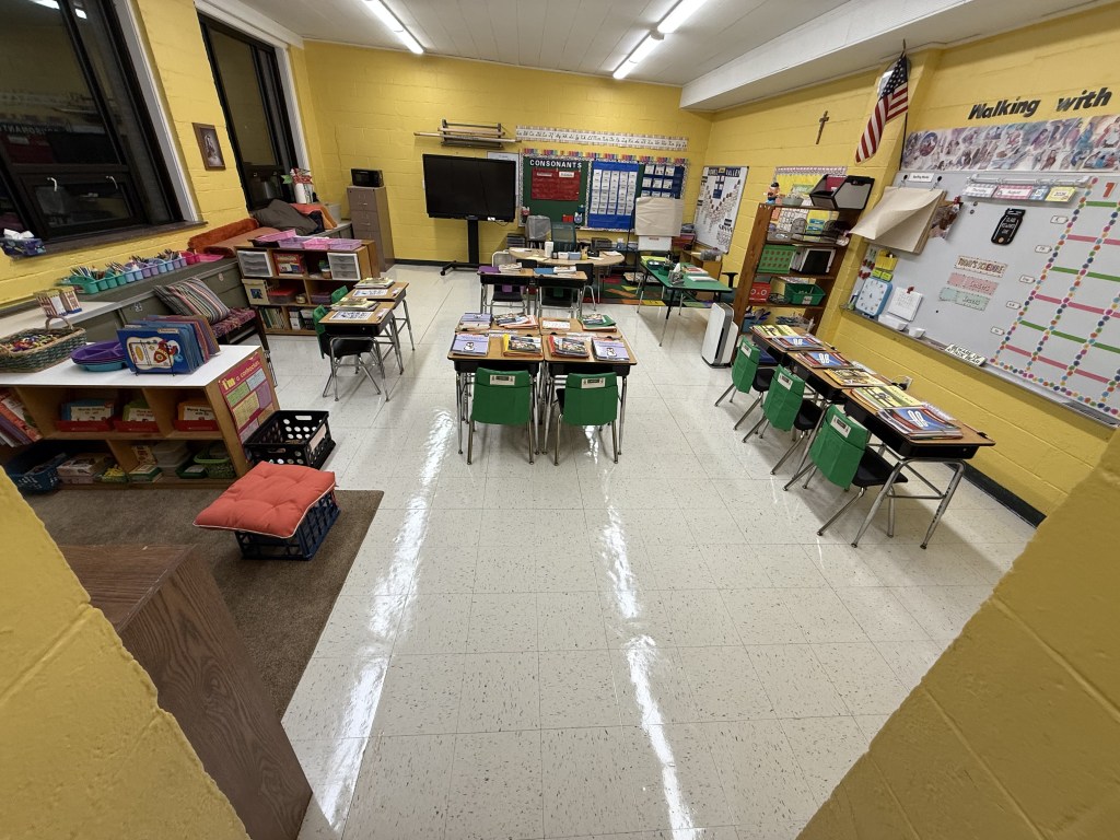 Strip and wax flooring in a commercial classroom